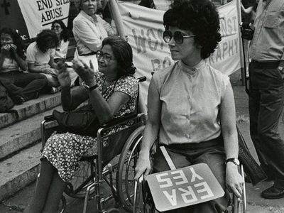 Two supporters of the Equal Rights Amendment demonstrate in August 1980. 
