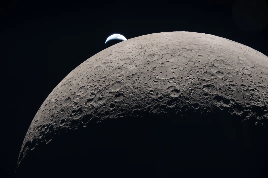 Earth seemingly setting behind the moon