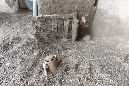 A bed frame shoved against the door served as a makeshift barricade.