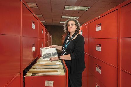 Archivist Patti Williams pulls an item from the more than 1,920 cubic feet of material in the National Air and Space Museum’s Technical Reference Files.