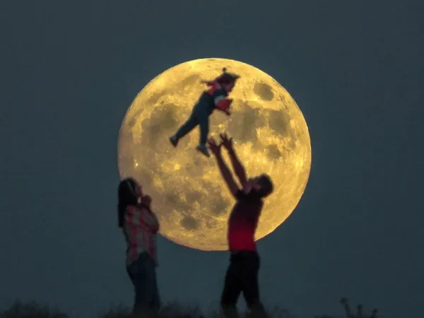 A happy family on the moon thumbnail