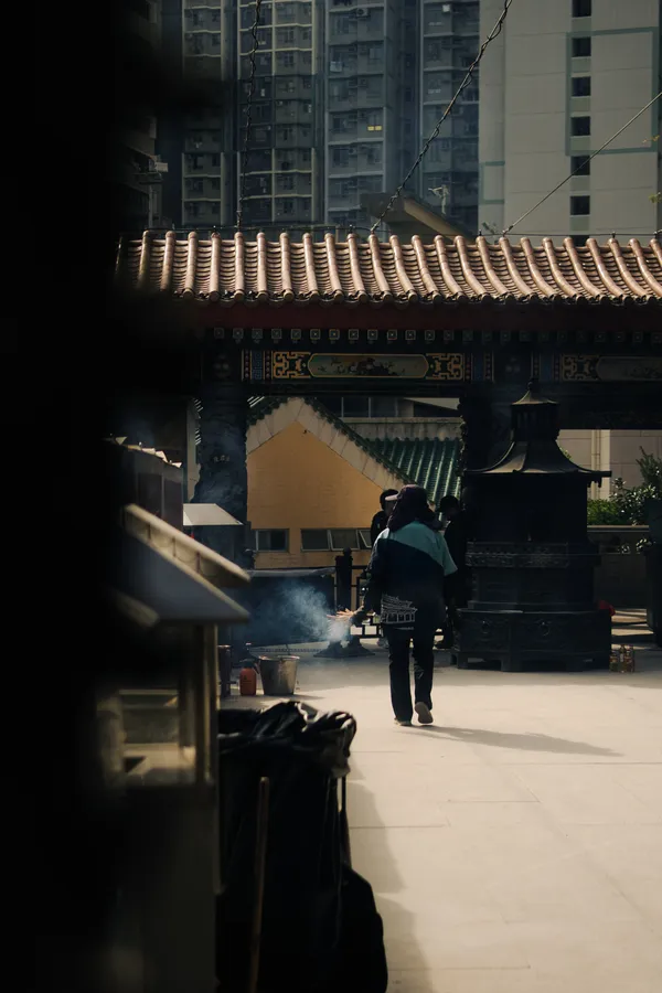 A person airs their incense at the temple thumbnail