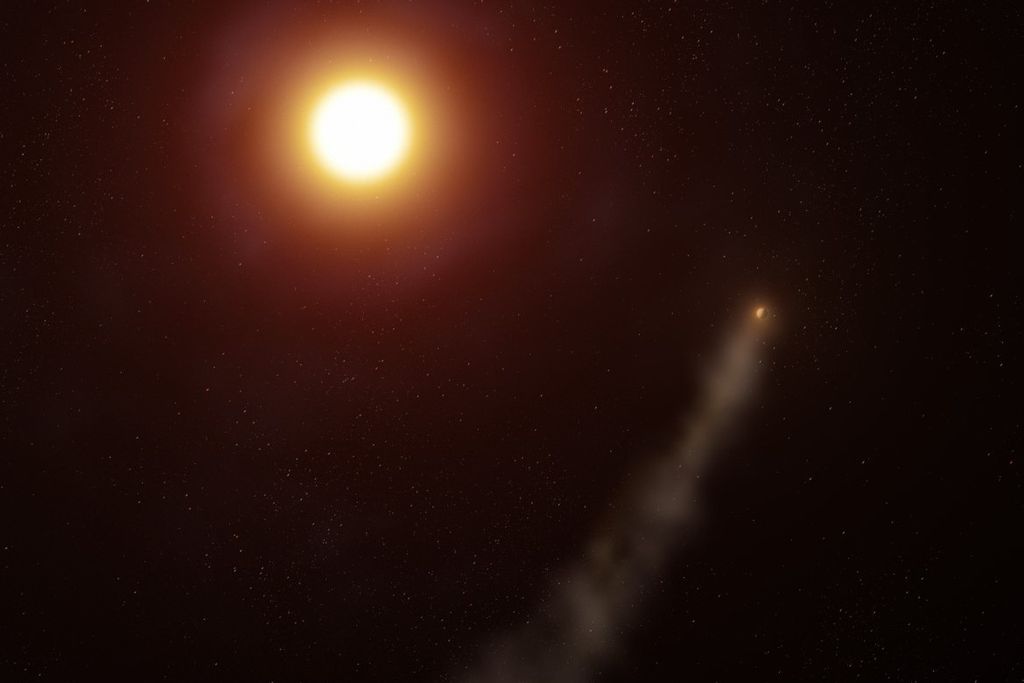 An image of a planet with a tail of gas behind it circling a sun