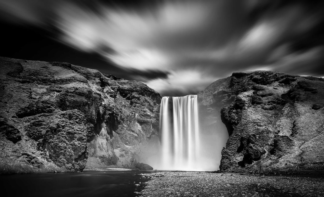 Long exposure of a massive 60m tall waterfall Skogafoss in southern ...