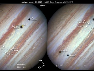 Hubble view of Jupiter moons transiting the planets surface on January 24, 2015.