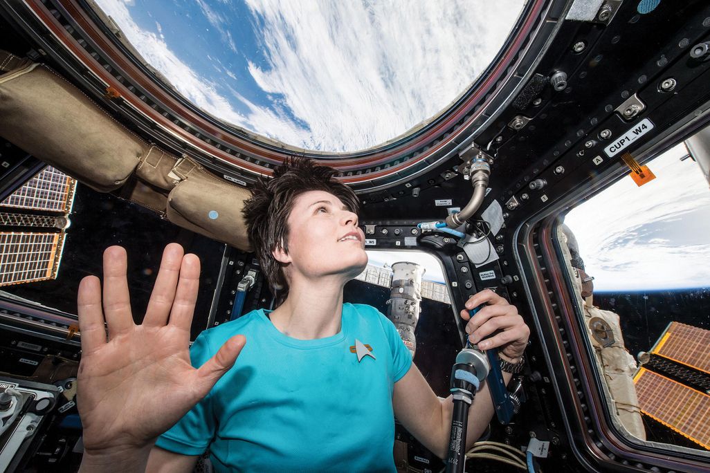 astronaut in space giving Vulcan salute