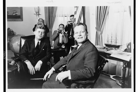 President John F. Kennedy sits in the Oval Office with West Berlin's Mayor Willy Brandt in 1961.  The Berlin Wall would be erected only a few months later. 