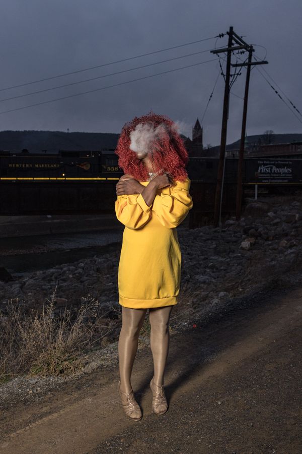 Drag queen Maxine Young poses near the railroad tracks in Cumberland, MD thumbnail