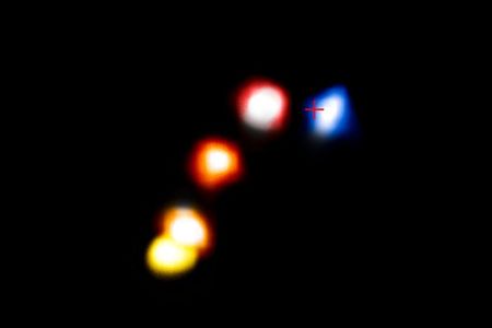 The blobs, colored to show motion, are G2 as it approaches and passes the supermassive black hole at the center of our galaxy