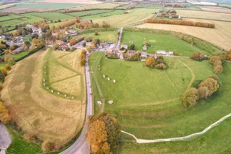 Avebury stands some 25 miles north of Stonehenge and is large enough to fit two Stonehenge-sized circles. 