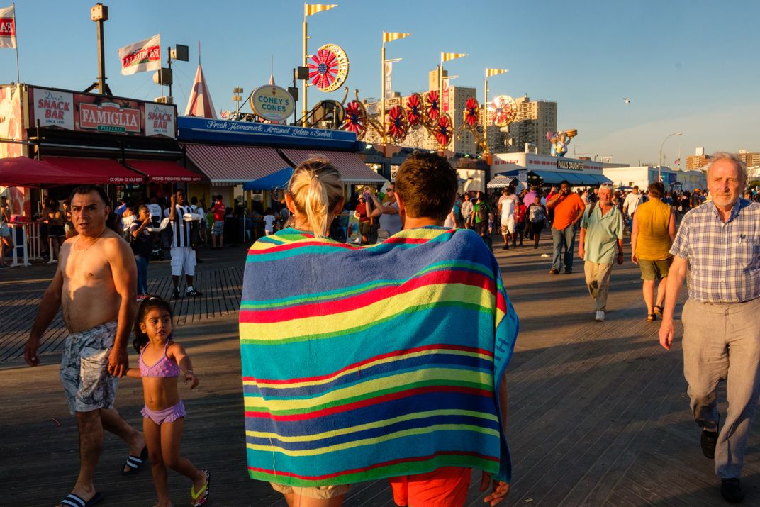 Couple wrapped in a towel at Coney Island