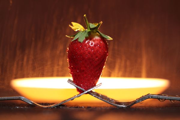 Strawberry on two forks thumbnail