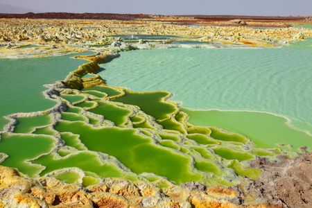 The colorful salt terraces in the Dallol region of Ethiopia are hot targets for astrobiologists seeking extreme microbial life that could resemble extraterrestrials.