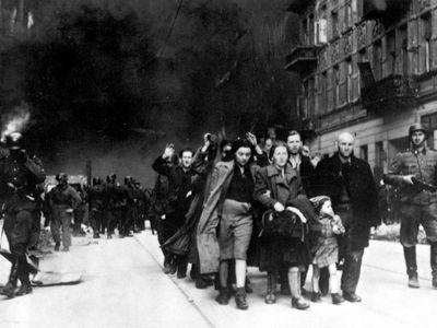 Jews being led for deportation in the Warsaw Ghetto, during the Warsaw Ghetto Uprising in 1943.