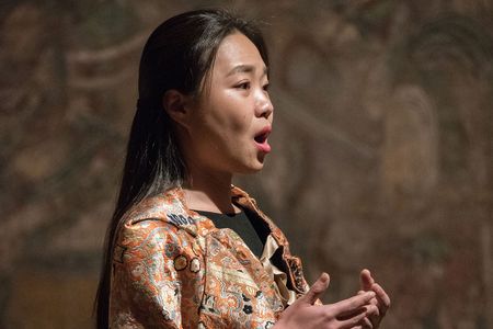 Sonic Blossom /2013–present / Lee Mingwei / Ongoing participatory performance installation with chair, music stand, costume, and spontaneous song / Installation view at “Lee Mingwei: Sonic Blossom,” The Metropolitan Museum of Art, New York, 2015 /Photo: Anita Kan.