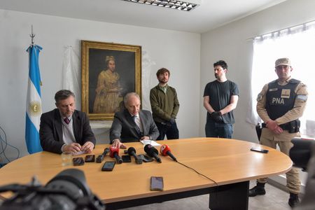 Argentine officials host a press conference in front of Portrait of a Lady, which had been stolen by the Nazis during World War II.