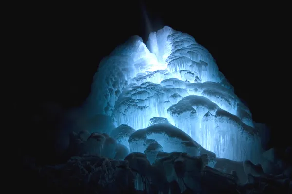 A water pipe in Duluth is "bled" every year to ensure it doesn't freeze. As the water freezes, it builds this amazing ice geiser, and looks like this if you stuff LED lights down it. thumbnail