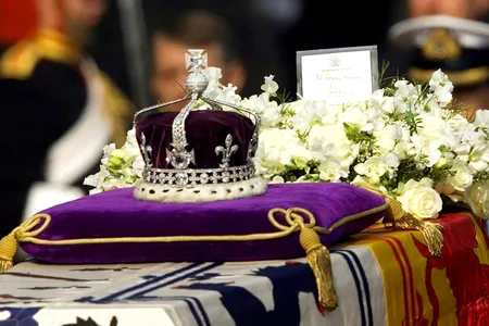 The Koh-i-Noor diamond set at the front of the crown made for the Queen Mother Elizabeth, set on her coffin in April 2002. 