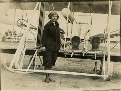 Ruth Law stands in front of her Wright Model B biplane at the New York State Fair, Yonkers, 1913.