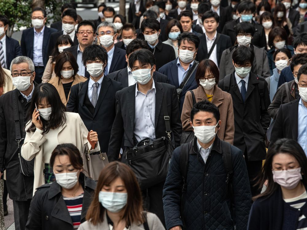 Commuters wearing masks in Tokyo