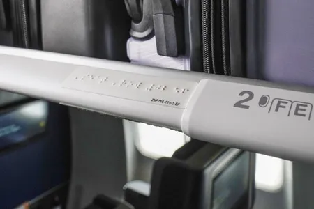 Braille signage will be added to rows and individual seats, as well as lavatories.