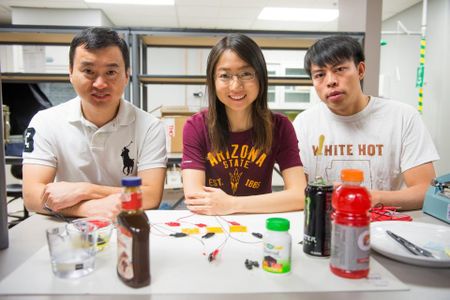 Hanqing Jiang (left) and his students, Wenwen Xu and Xu Wang, with their supercapacitor materials