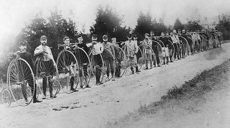 Balancing act: men and their big-wheeled ordinaries in one of the first bicycling touring clubs, in 1879 near Readville, Massachusetts.