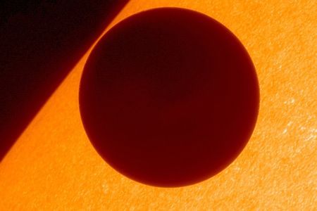 Venus crossing the disk of the sun in 2012, as seen by the Japanese Hinode satellite.