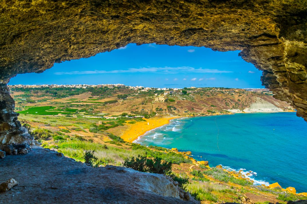 View of Ramla Bay from Tai-Mixta Cave, the island of Gozo, Malta