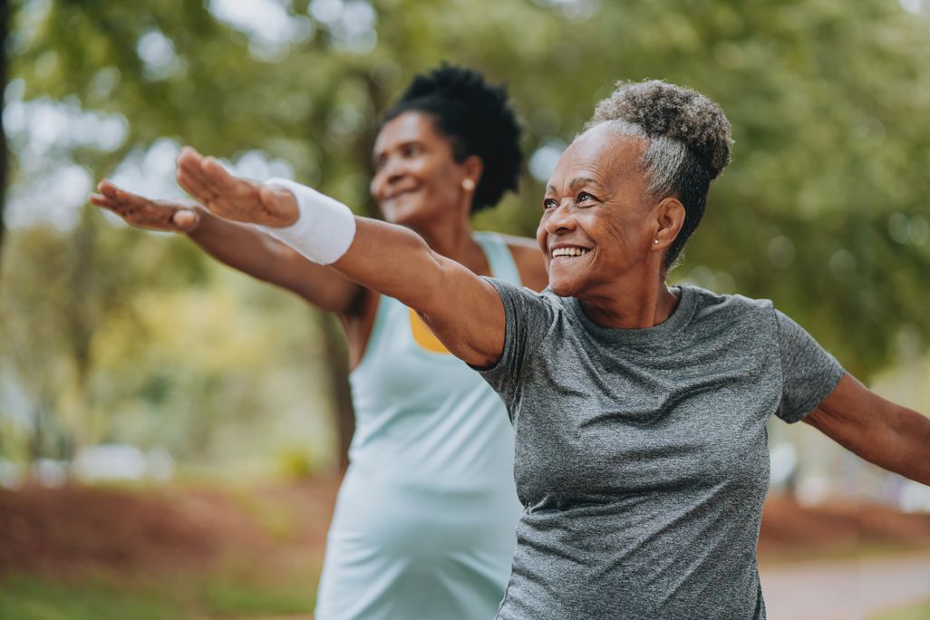 two older women exercising together