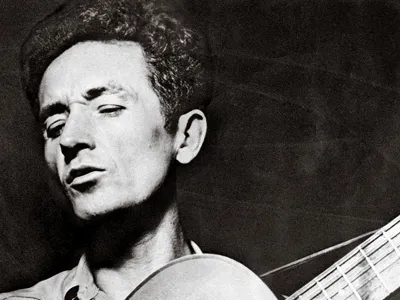 Woody Guthrie, shown here in the 1940s, created great lines in songs and drawings.