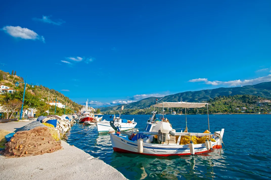 A fishing boat moored off the pier on the Greek isle of Poros