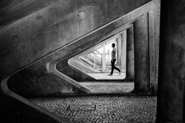 OPENER - Almost like an arrow, the somewhat triangular shape of the architectural framework points this pedestrian in the right direction.
