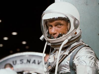 John Glenn, dressed for space in his Mercury pressure suit.