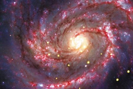 Deciphering the universe is a "Grand Challenge." Shown here is Galaxy M100.