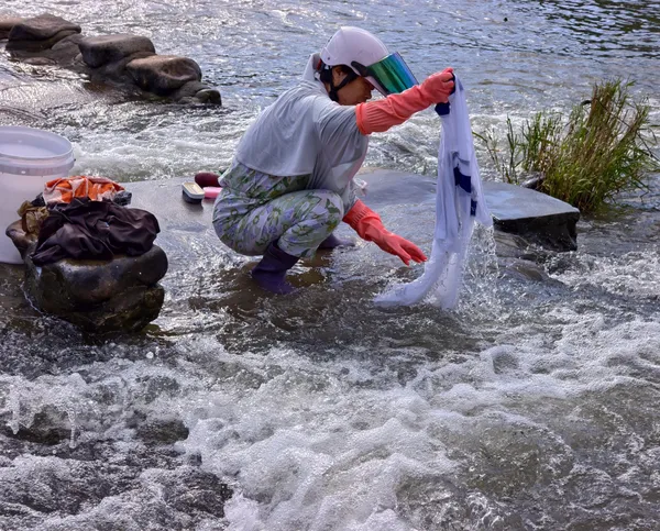 Washing clothes by the river thumbnail