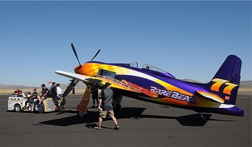 The winning-est Bearcat in race history gets a tow to the runway for Saturday’s heat. Rare Bear (the cover story of the November 2009 issue of Air & Space) brought a new paint scheme, a stirring history, and lots of heart to the Unlimited Gold, but not a