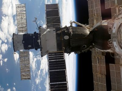 Safe harbor: A Soyuz (foreground) and Progress supply vehicle docked to the International Space Station in August 2007.
