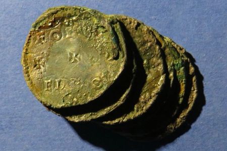 Twenty coins discovered in Rome may be the first physical evidence of a "Little England" enclave.
