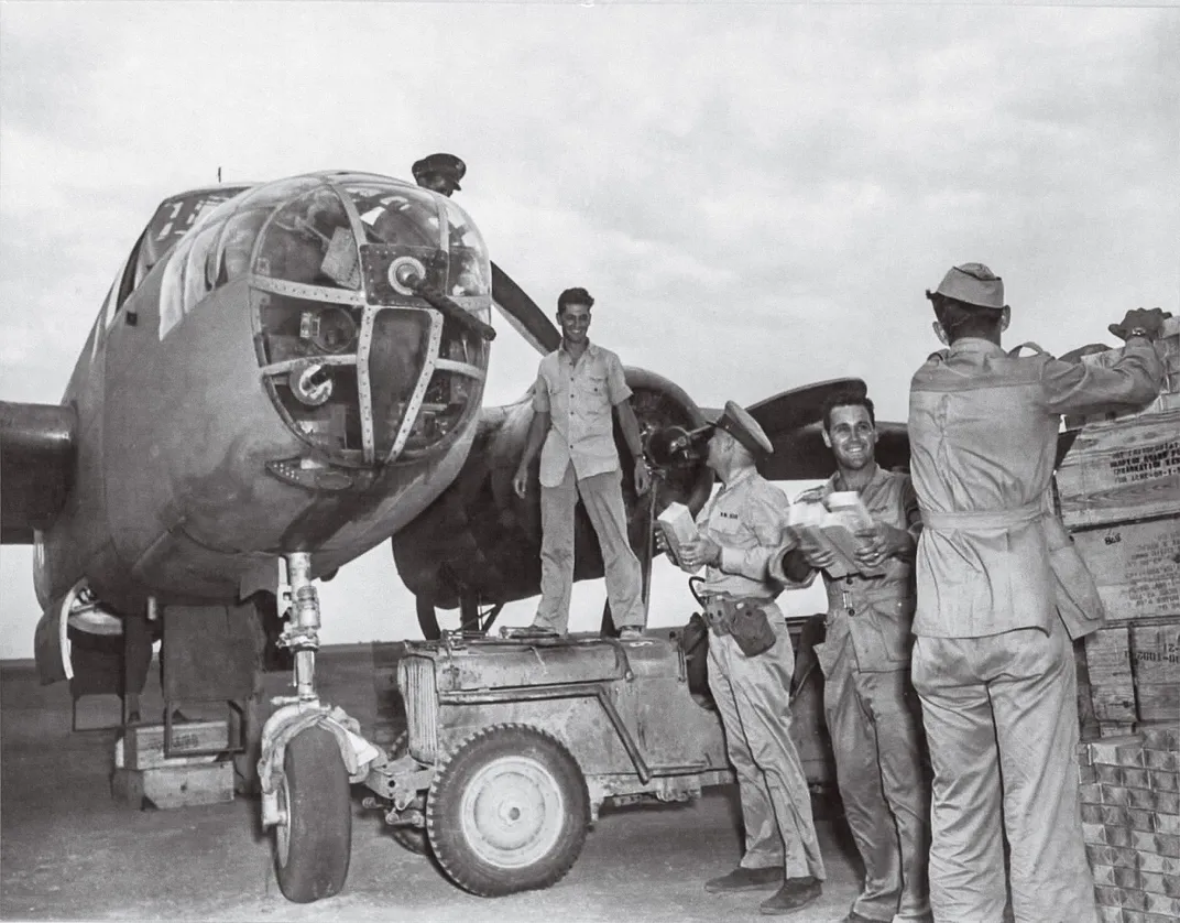 men unloading aircraft of supplies
