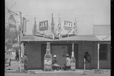 Black and white photograph of a the façade of a Mexican beer hall in Texas.