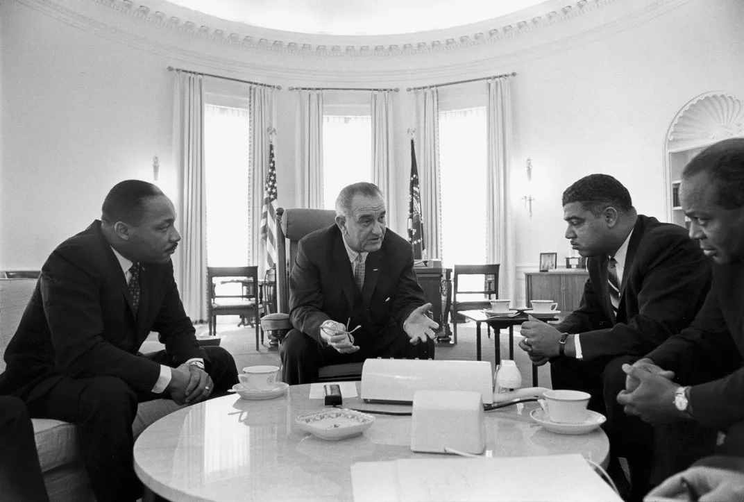 Johnson meets with civil rights leaders Martin Luther King Jr. (left), Whitney Young and James Farmer in the Oval Office in 1964