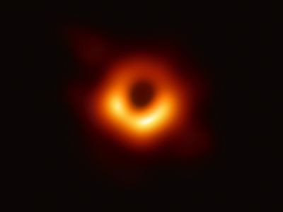 The image reveals the black hole at the center of Messier 87, a massive galaxy in the nearby Virgo galaxy cluster. This black hole resides 55 million light-years from Earth and has a mass 6.5 billion times that of the sun.