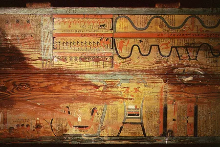 The floor of one of the coffins of Gua, a physician of the governor Djehutyhotep. The paintings, dated to 1795 B.C., show the “two ways”—land and sea—that the dead could use to navigate the afterlife. An even older “Book of Two Ways” has now been unearthed.