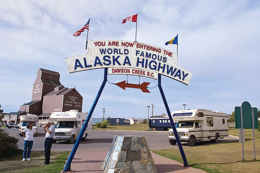 sign for the entrance of the Alaska Highway