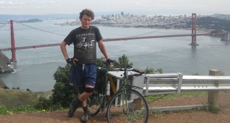 The author and his bike stand about 850 feet above San Francisco on Conzelman Road. Repeated 10 times, this little hill amounts to a world classic of climbing.