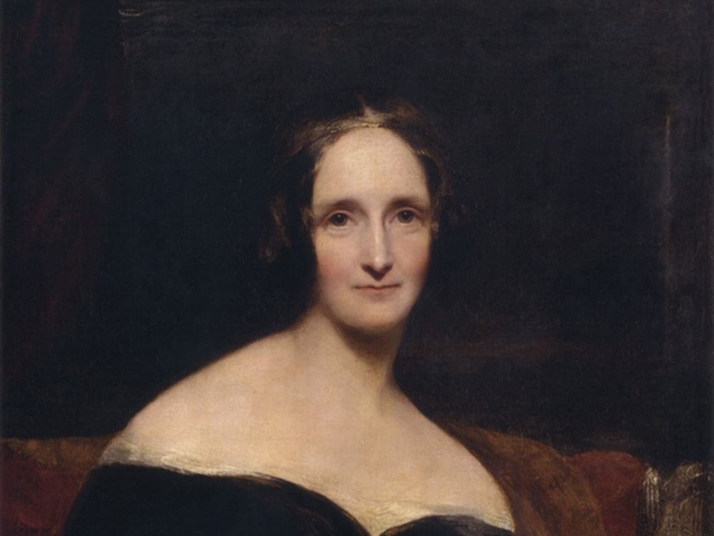 A moody portrait of Mary Shelley, a pale woman wearing a dark dress in front of a dark red and brown background