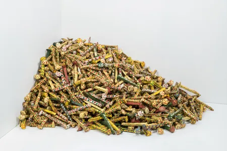 Albert &ldquo;Kid&rdquo; Mertz (above:&nbsp;Untitled, c. 1980)&nbsp;painted hundreds, possibly thousands of railroad spikes he had collected from tracks near his property, giving each spike a&nbsp;cheerful face.