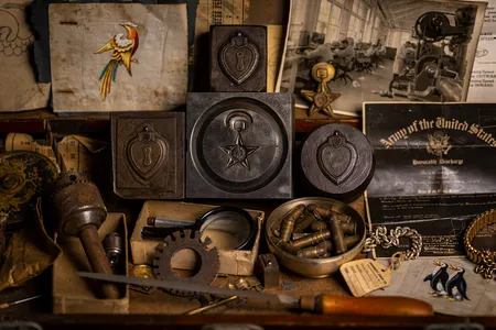 Original hand-carved hubs for the Purple Heart and Silver Star rest in the jeweler&rsquo;s toolbox of legendary Providence-based hub carver Elio &ldquo;Duke&rdquo; Lossini.