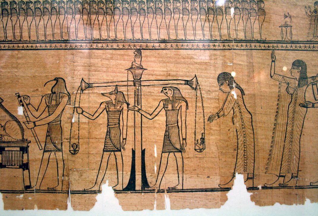The Weighing of the Heart ritual, as shown in the <em>Book of the Dead</em> of Sesostris